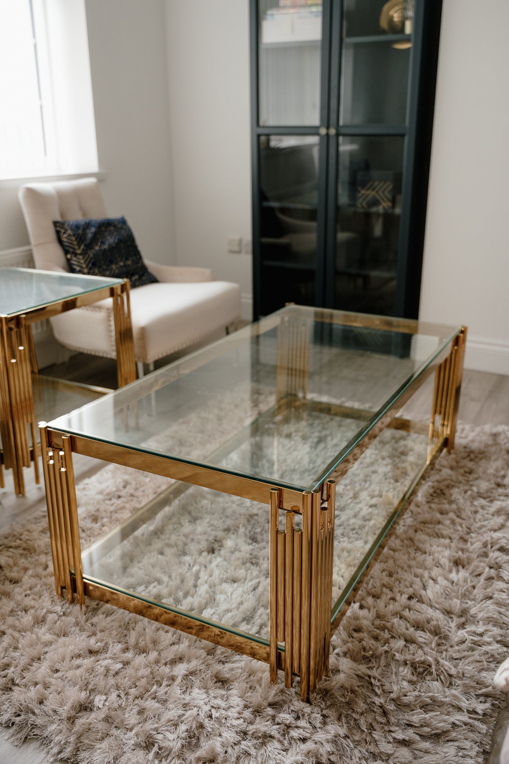 Cohen Gold Metal Tubes & Clear Glass Coffee Table
